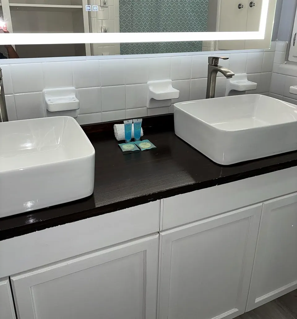 Bathroom with double vessel sinks after cleaning