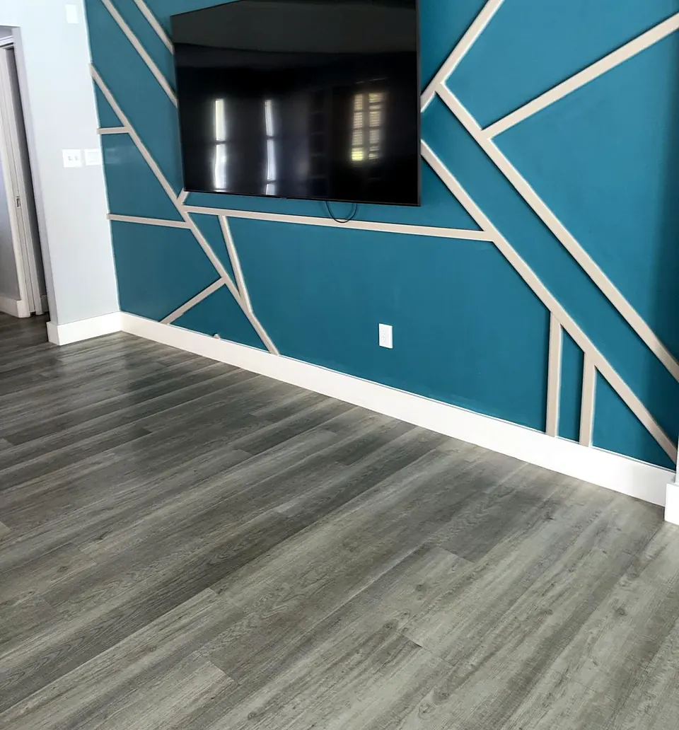 Empty bedroom with an accent wall, cleaned and ready for a move-out inspection