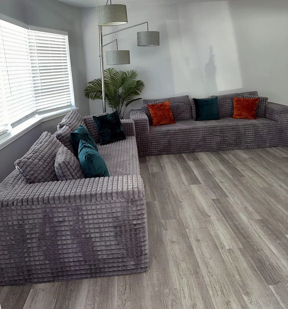 Living room with gray sofas after cleaning