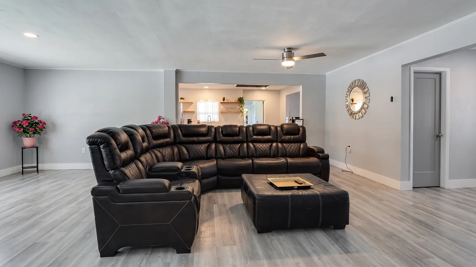 Living room with a leather sectional after cleaning