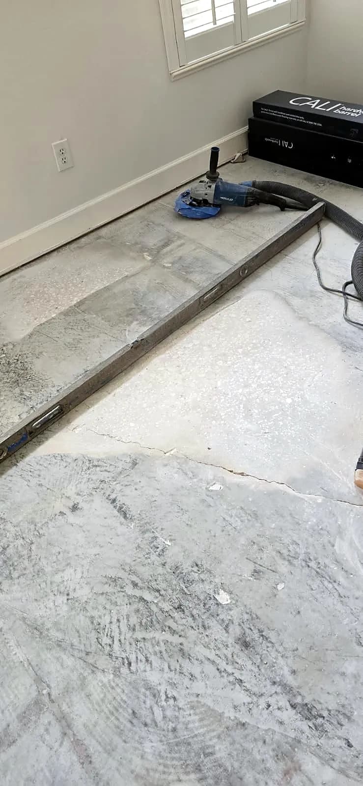 Concrete subfloor prepared before new flooring